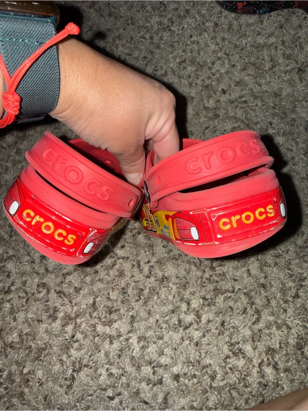 CROCS Red Kids Slip-On Clogs with Playful Eye Graphic